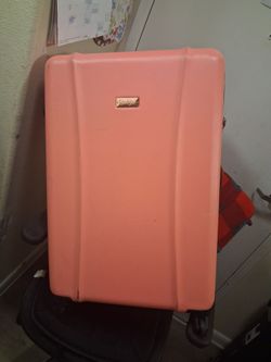 Used pink Jessica Simpsons suite case