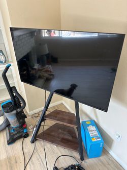 45” Hisense TV + Corner TV Stand Combo – Great Condition