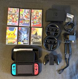 Nintendo switch with games and accessories