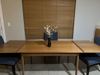 Danish modern bow edge Dutch leaf dining table in teak....