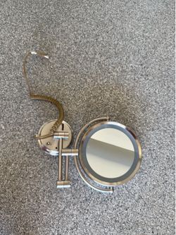 Wall mounted make up mirror