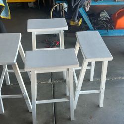 Four White Bar Stools 