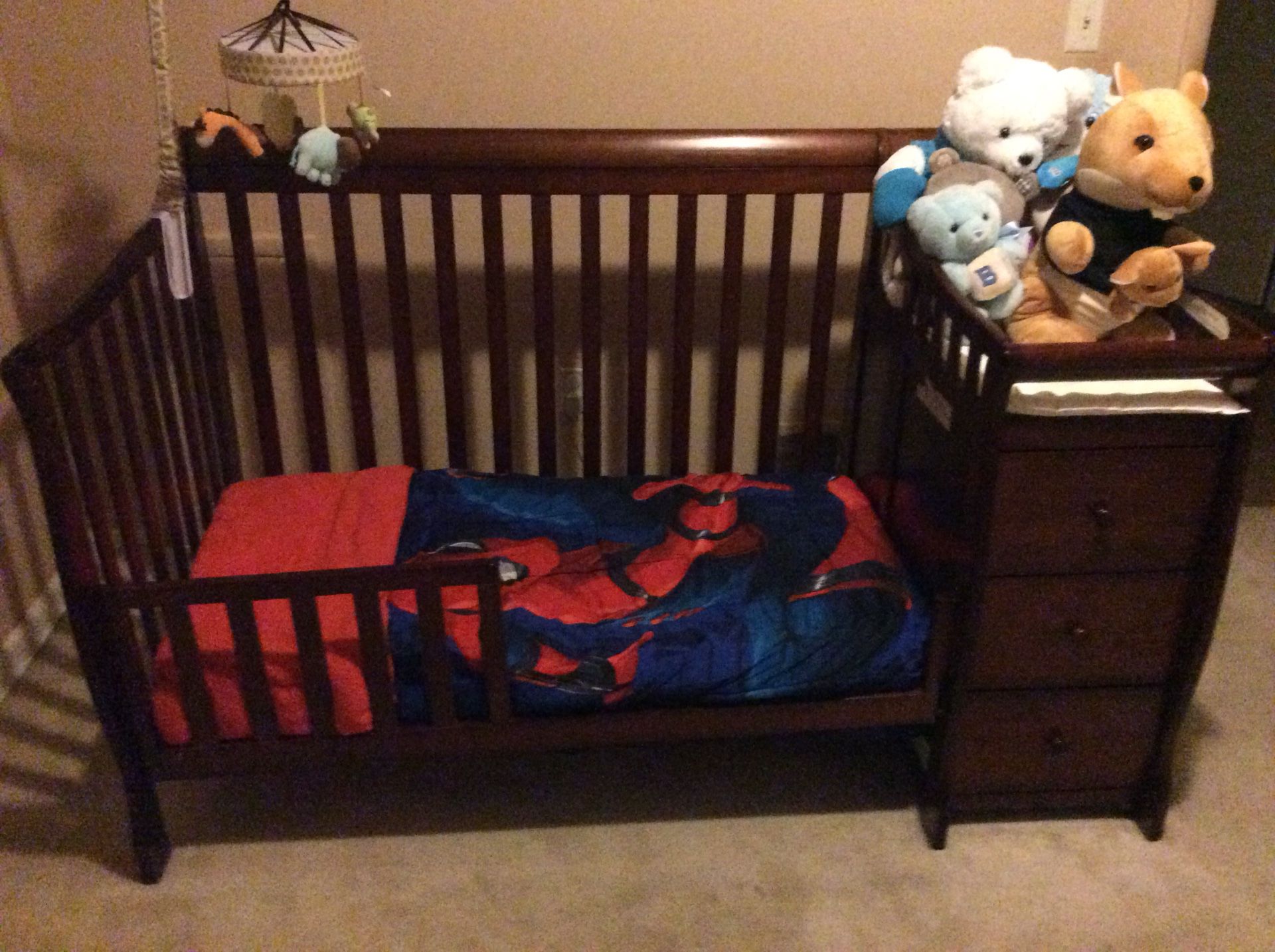 Expresso crib/toddler bed/full size bed with attached changing table.