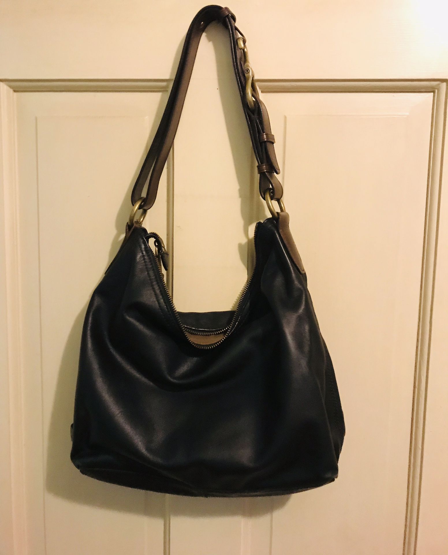 Cole Haan Soft Leather Hobo Shoulder Bag (12” W 15”L) with Gold Buckle and Brown Fabrics and Pockets Inside. Very Food Condition
