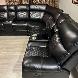 LEATHER BLACK OVERSIZED RECLINER SECTIONAL W/CUPHOLDERS & STORAGE 