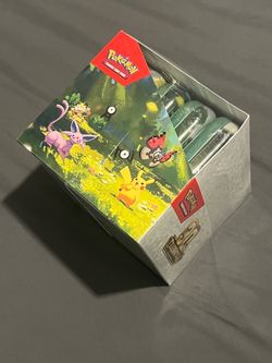 Pokemon 30th anniversary tin display