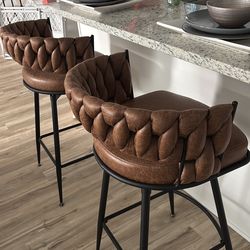Two leather like new bar stools