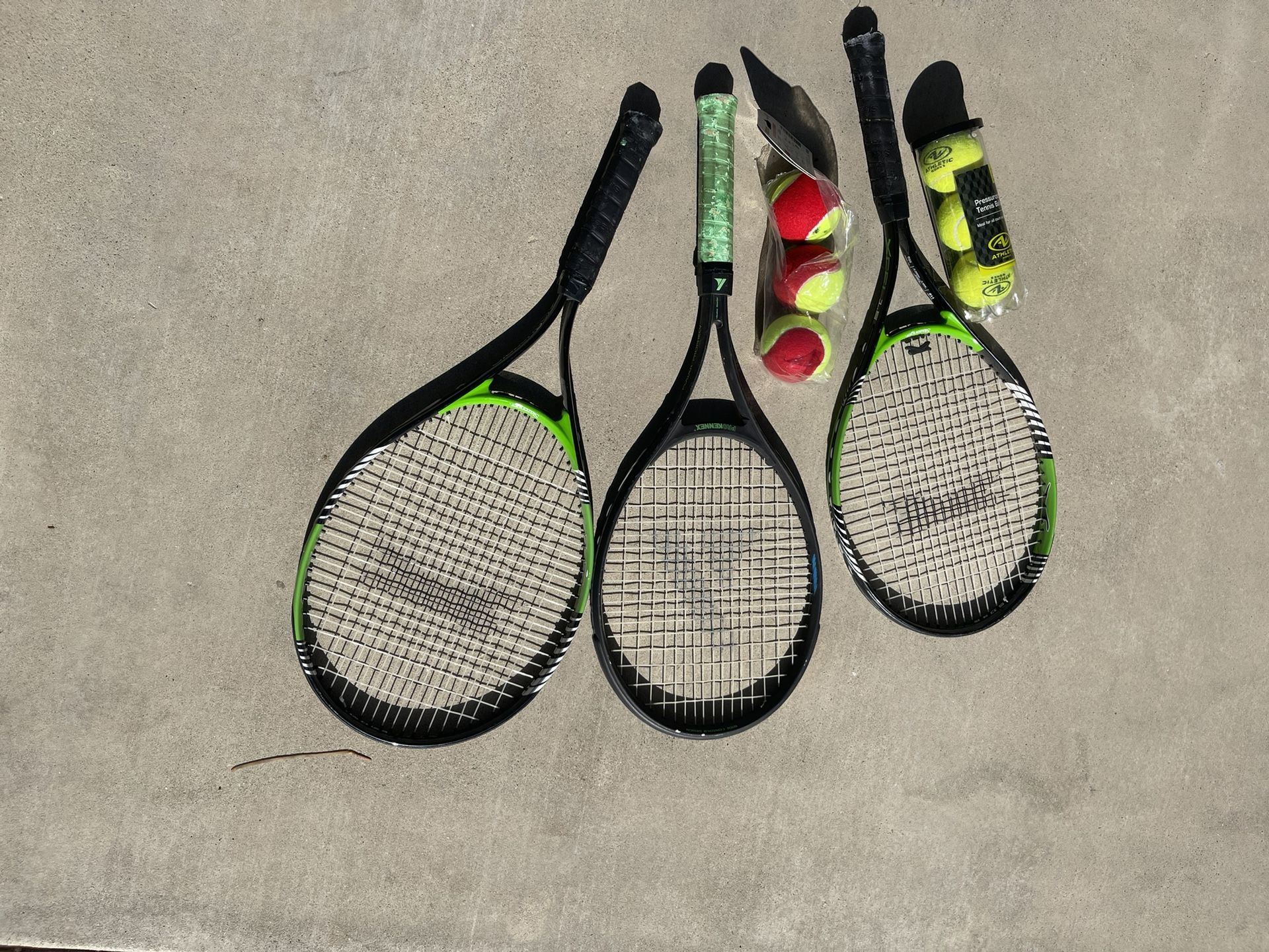 Three Tennis Rockets