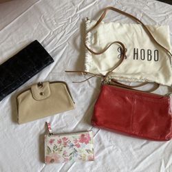 Variety Of Wallets And One Handbag