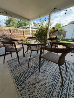 Patio table and 4 Ratan chairs