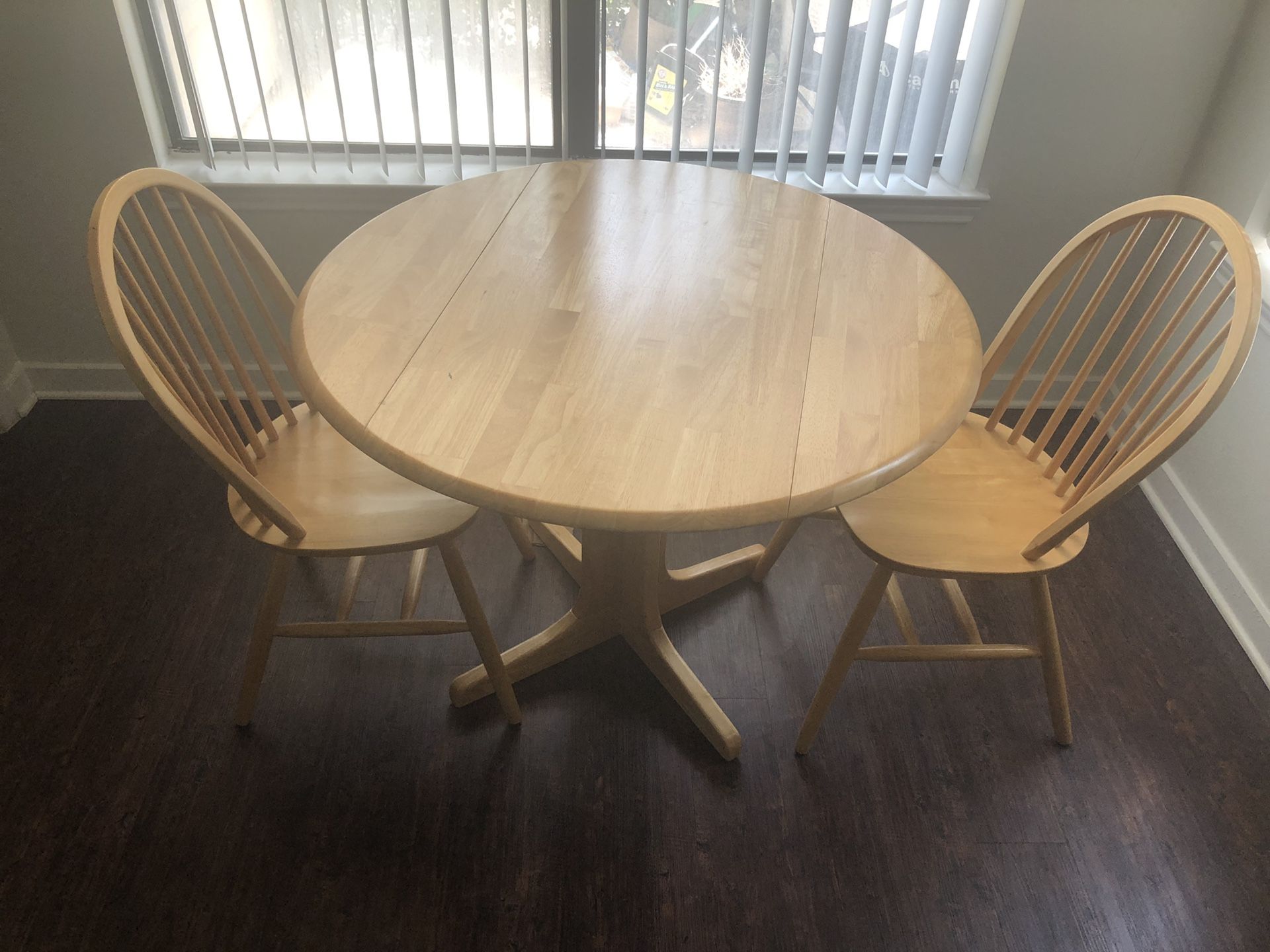 Kitchen table with both chairs. Must pick up.