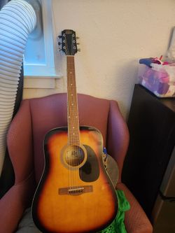 Rogue acoustic guitar