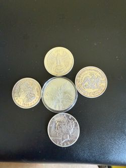 Five One ounce Choice Coins