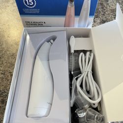 New in the box microdermabrasion machine. $20
