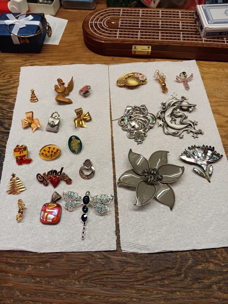 22 Different Brooches