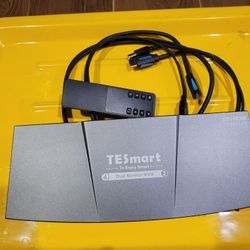 TESmart Dual Monitor KVM Switch, which allows you to control multiple computers with a single set of keyboard, mouse, and monitors. 