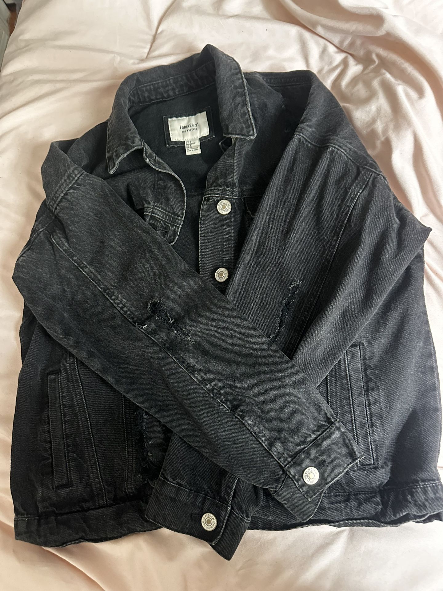Distressed denim jacket
