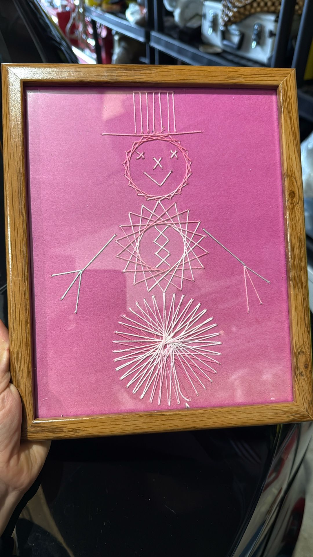 Embroidered snowman in a wooden frame