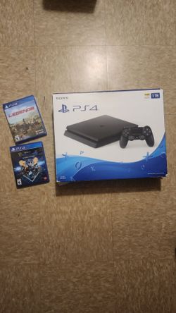 NIB NEVER USED PS4 1TB WITH GAMES
