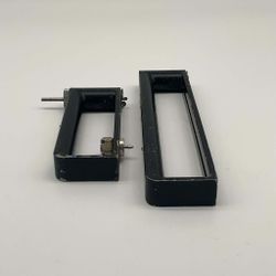 Malco HC1 and Malco HC2 sheet metal hole cutters, designed for adjustable diameter cutting in HVAC applications.