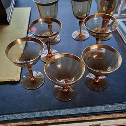 Gold rimmed Amber Glasses
