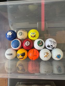 Collectible golf balls, Jordan 23, $100 bill, etc.
