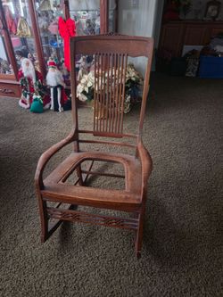 Rocking chair, antique oak.Great shape just needs seat fixed