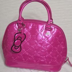 Loungefly. Sanrio Hello Kitty Hot Pink
Embossed Dome Bag