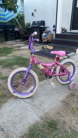 Barbie girl bicycle with training wheels gorgeous style and color everything works excellent clean