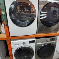 New LG Front Load Washer And Stackable Gas Dryer Set 