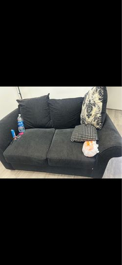Black couch $100 o.b.o with pillows