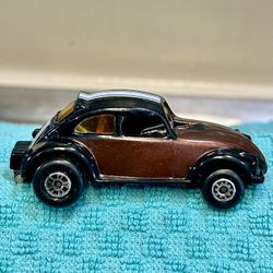 Vintage 53yo  1972 Matchbox Superfast No. 46 "Hot Chocolate" Volkswagen Bug diecast toy car.  It is a 1:64 scale