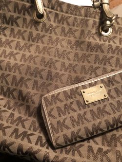 Large Michael Kors bag with matching wallet!