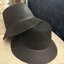 Set of two black felt hats in excellent condition.