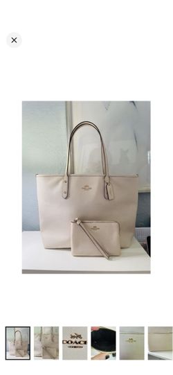 COACH City Tote in soft chalk pebbled leather featuring a timeless minimalist silhouette with matching wristlet pouch.