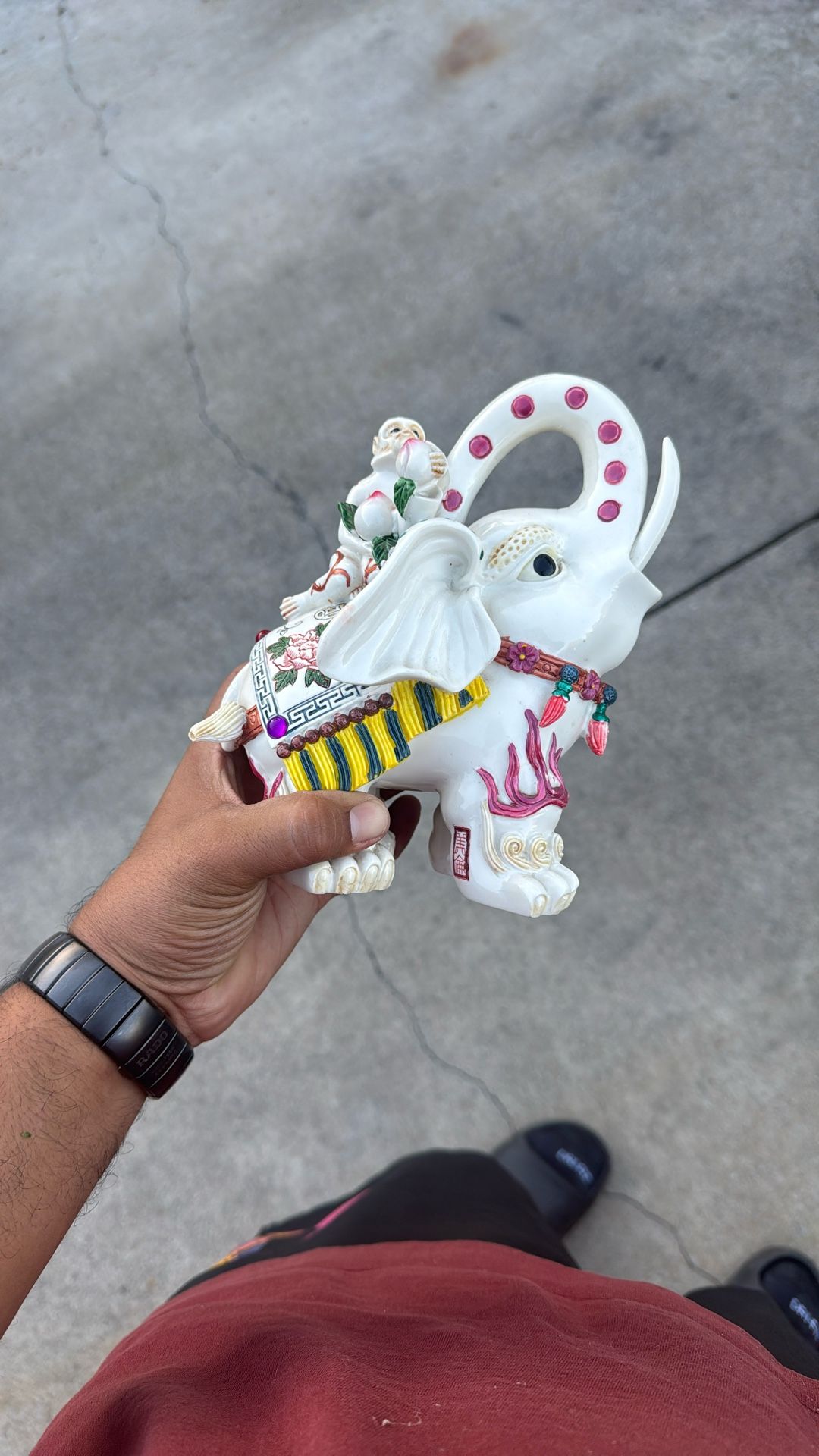 vintage porcelain figurine of an elephant with a monkey on its back