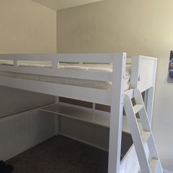 Full size bunk bed with built in desk and dresser