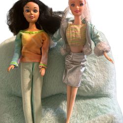 2 Barbie one is a 1993 bendable legs other no info on her black hair doll need some care to her hair she is 1993. The blond Barbie has no date on her 