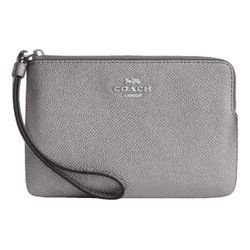 silver metallic coach wristlet