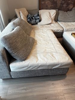Modern two tone sectional sofa with matching ottoman