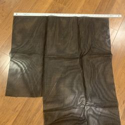 Sheet of black look through material