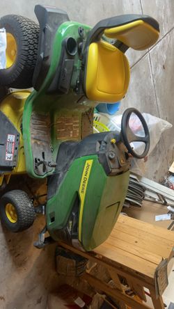 John Deere Sit Down Mower And Toro Snow Blower