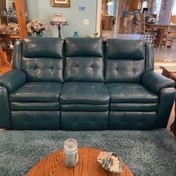 Beautiful Green Leather Reclining Sofa. $1650