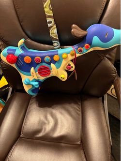Guitar  (NEW).  Youth toy. $24