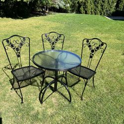 Vintage Wrought Iron Patio Chairs And Glass Table 