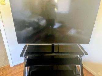 57 inch with Stand/Legs for TV Included