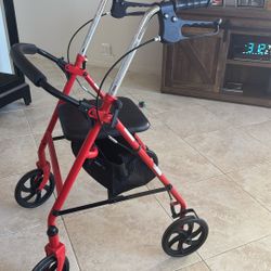 4 Wheel Walker With Seat And Basket. 