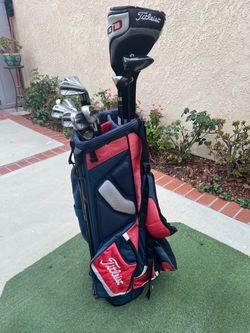 Titleist irons set (AP-1:new grip)and driver,wood and titleist golf bag included)