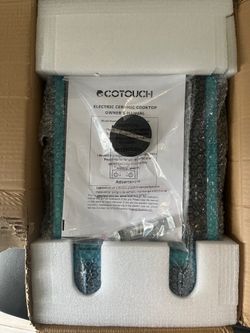 BRAND NEW OPEN BOX “COTOUCH” ELECTRIC CERAMIC COOKTOP. NEVER USED.