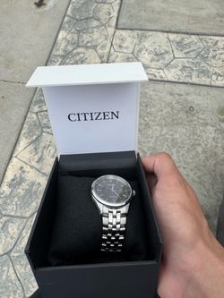 Citizen black and silver watch